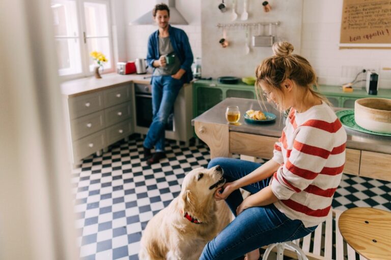 family in kitchen with dog