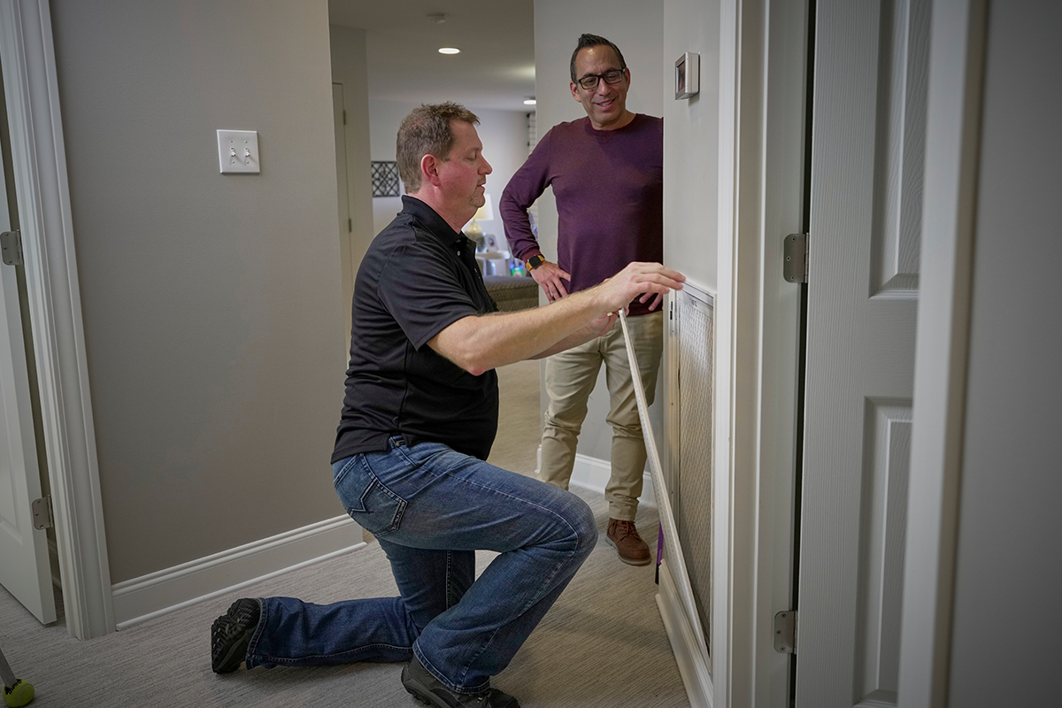 Trane Tech checking indoor air quality