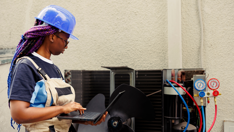 Woman fixing HVAC Unit